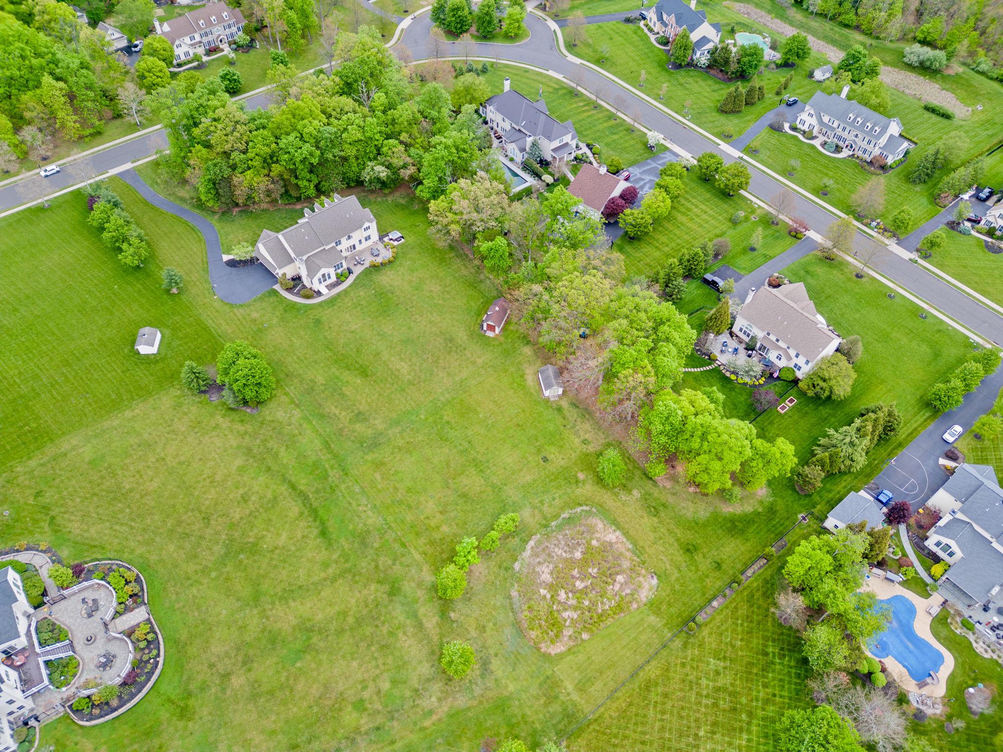 912 Ashbourne Way Schwenksville, PA 19473 - Photo 44 of 45 Lush suburban landscape with homes.