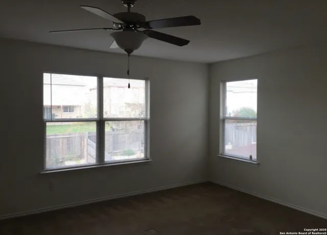 a bathroom with a shower and a sink