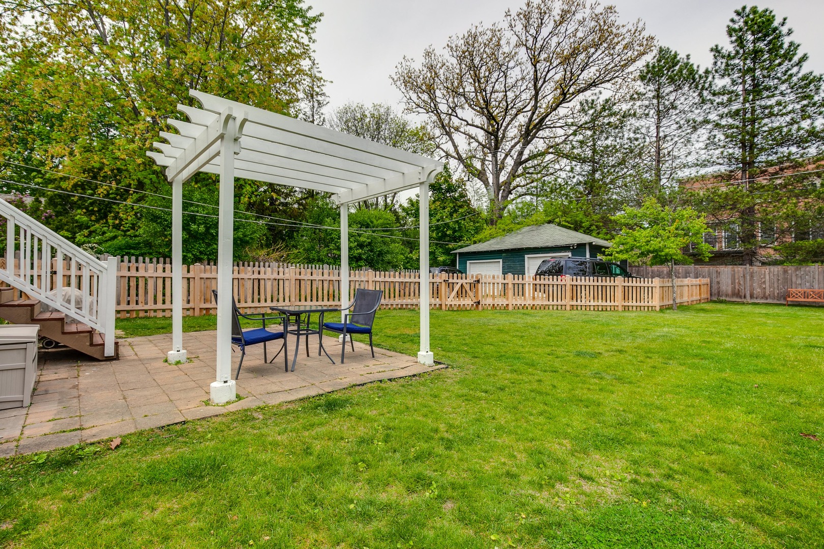 120 Atteridge Road Lake Forest, IL 60045 - Photo 24 of 26 a view of a chair and table in the yard
