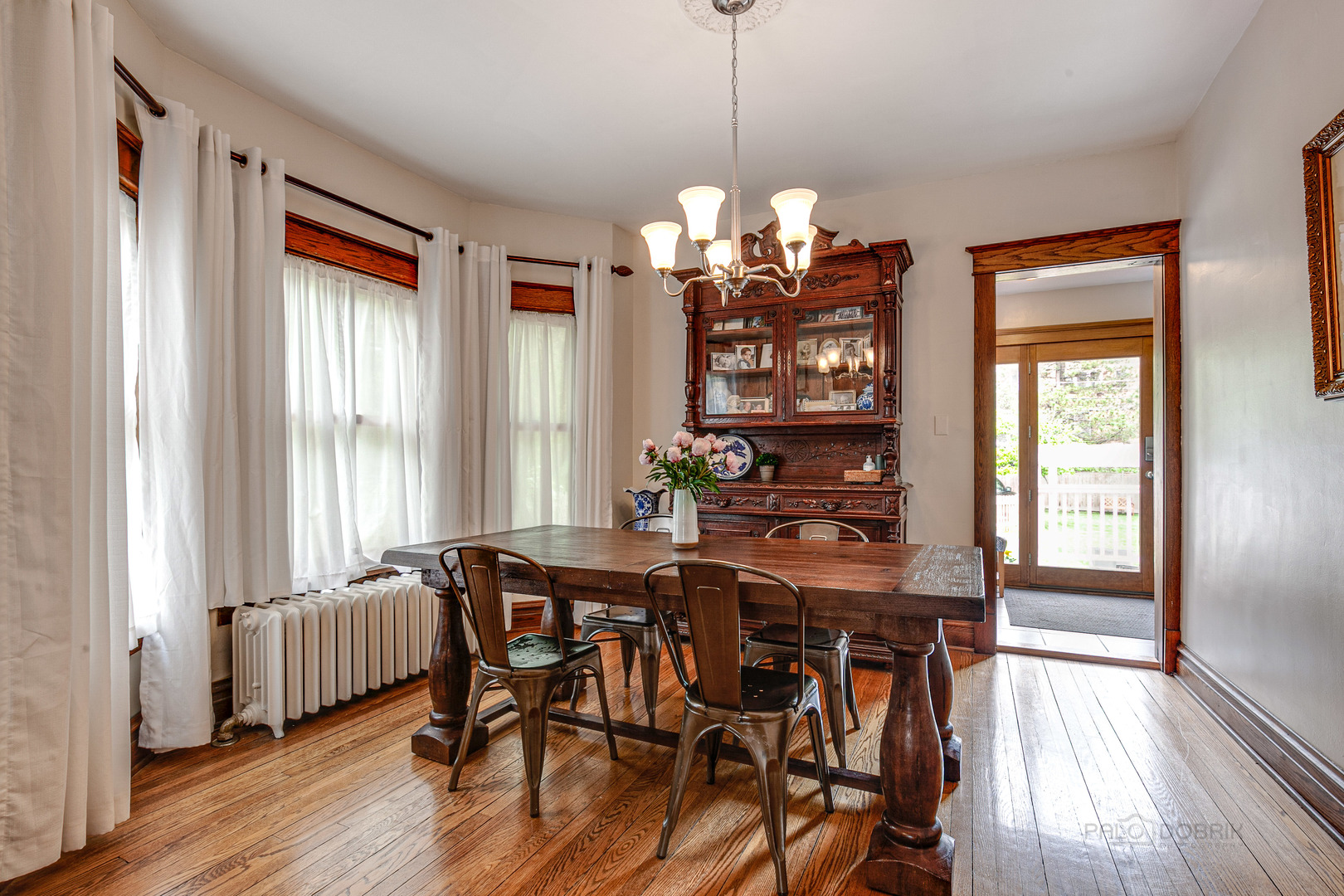 120 Atteridge Road Lake Forest, IL 60045 - Photo 7 of 26 a view of a dining room with furniture window and wooden floor