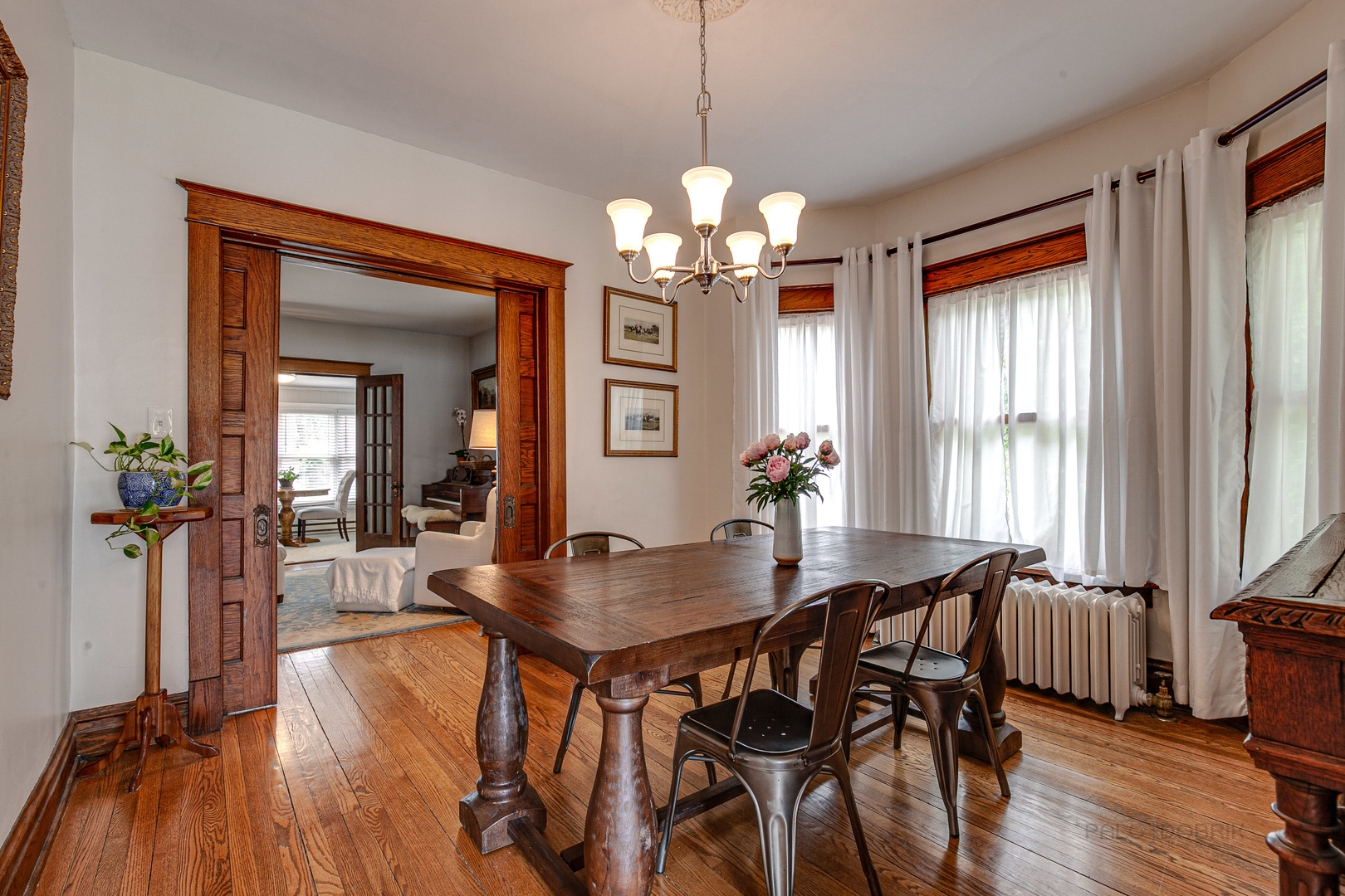 120 Atteridge Road Lake Forest, IL 60045 - Photo 8 of 26 a view of a dining room with furniture window and wooden floor