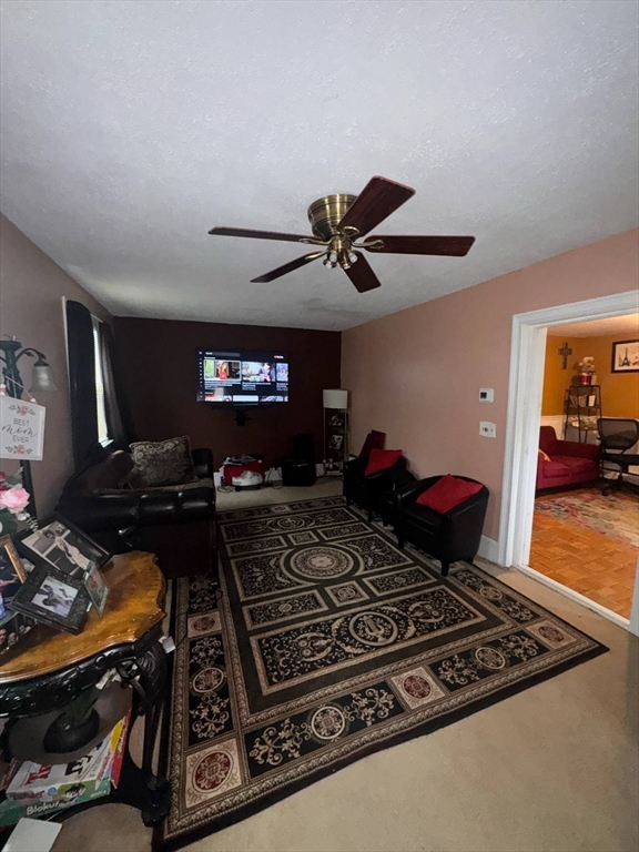 87 Exeter Street Lowell, MA 01850 - Photo 7 of 11 a stove top oven sitting inside of a kitchen