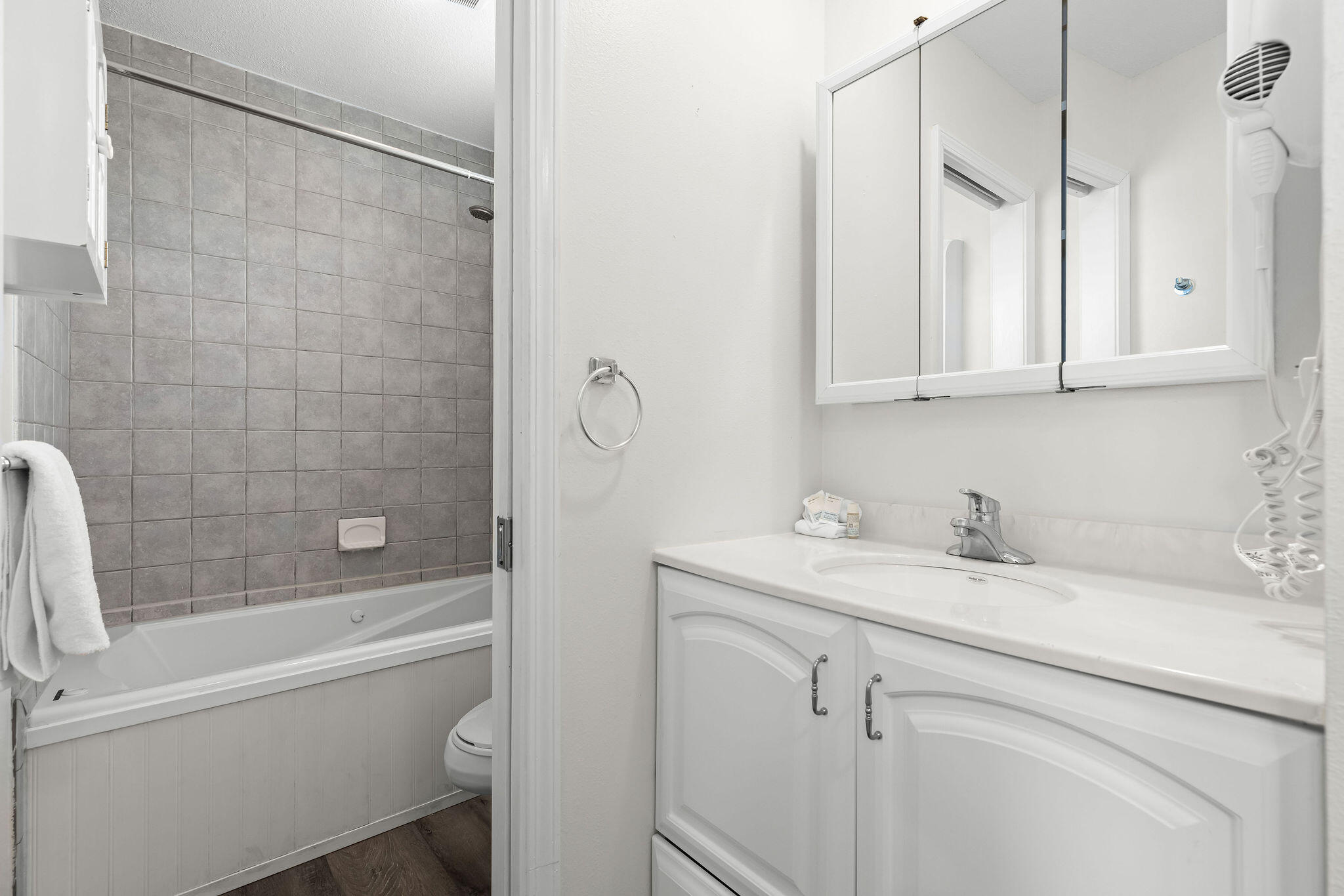91 Matthew Boulevard Destin, FL 32541 - Photo 84 of 85 a bathroom with a granite countertop sink a toilet and shower