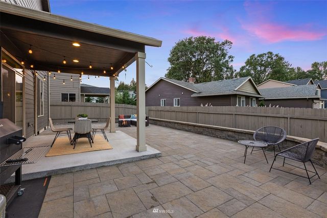 a view of a terrace with sitting area