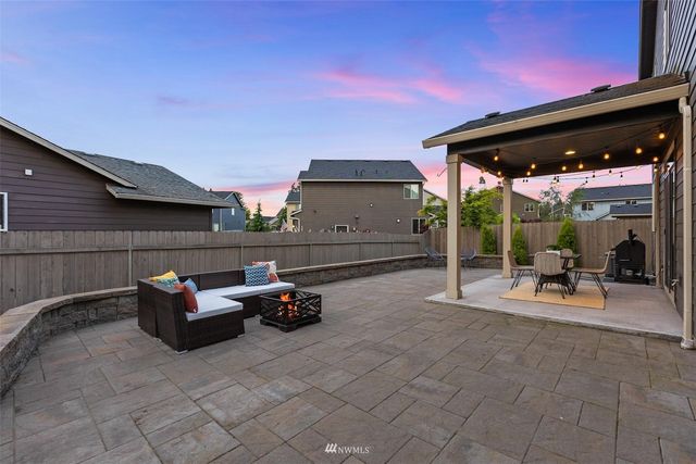 a view of outdoor space with lounge chairs