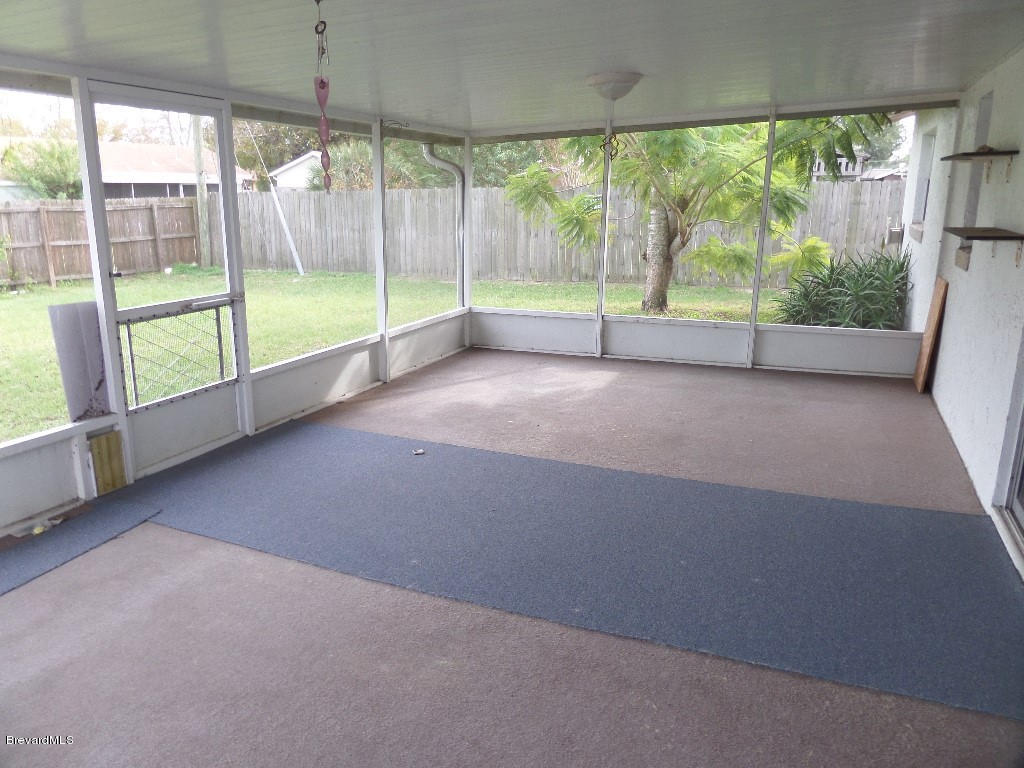 219 Capron Road Cocoa, FL 32927 - Photo 13 of 14 Screened Porch