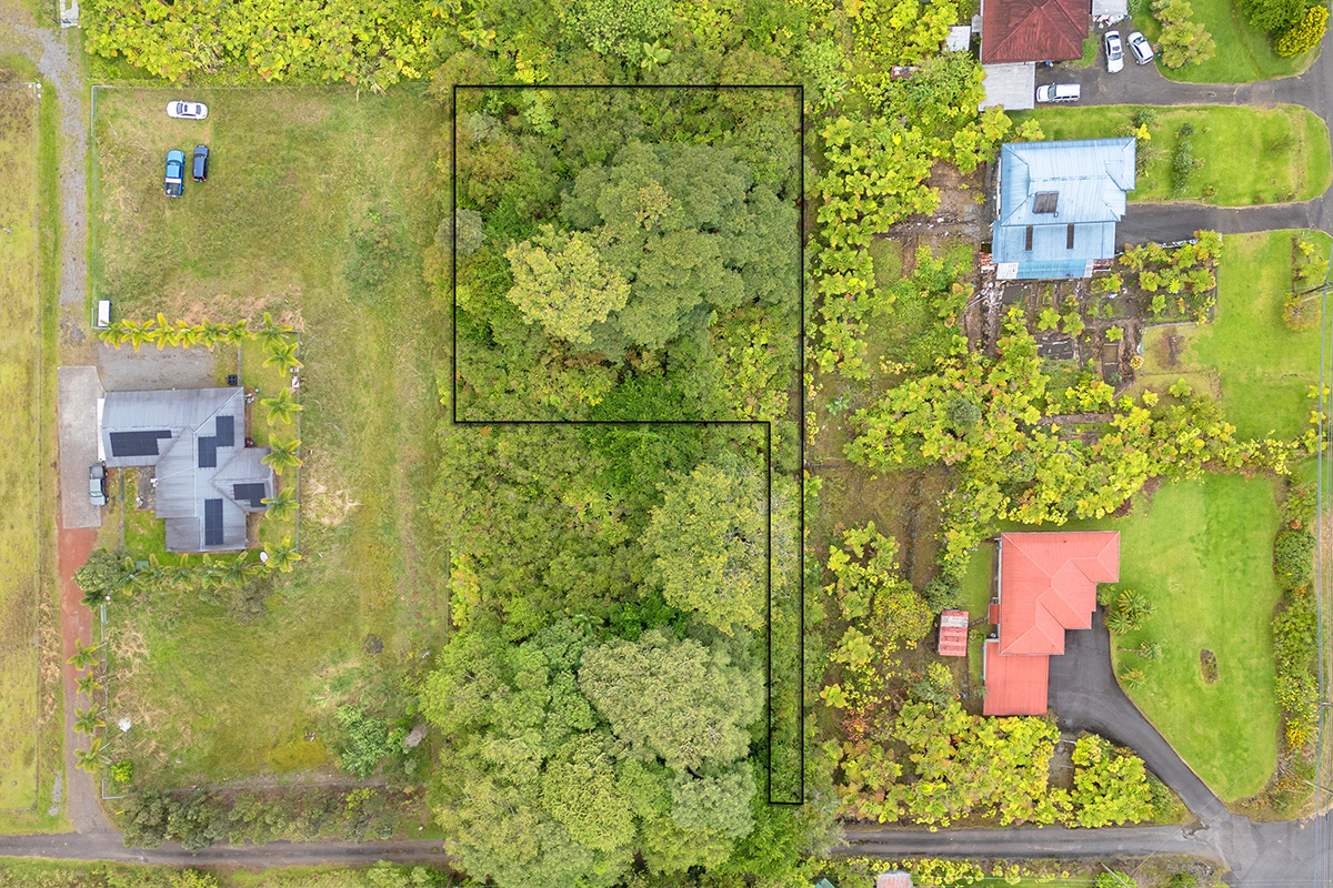 North Lauko Road Mountain View, HI 96771 - Photo 2 of 12 a bathroom with a shower and mirror