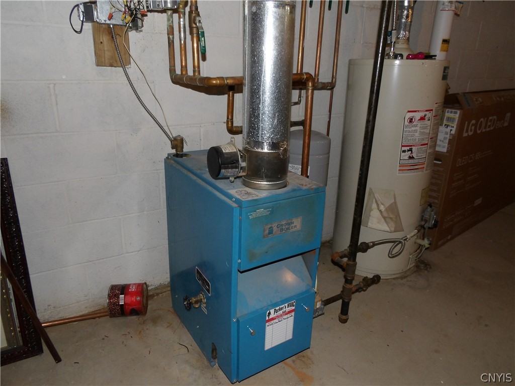 727 Bowling Green Road Cortland, NY 13045 - Photo 41 of 43 Boiler and Hot water heater
