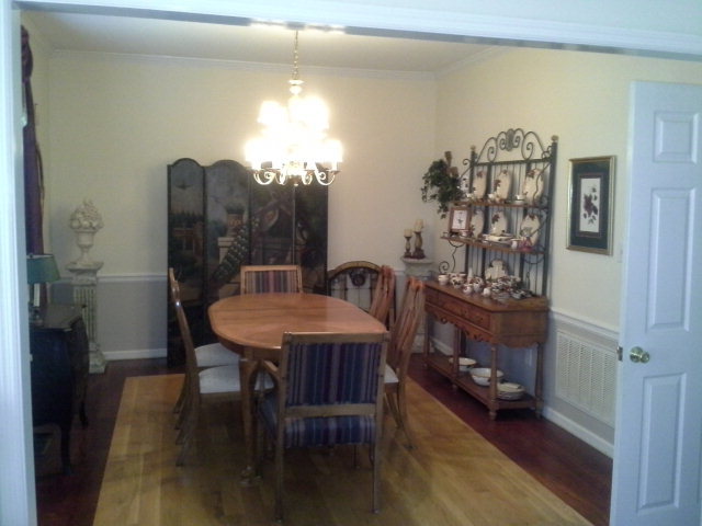 354 Old Oak Road, Unit 126 Macon, GA 31216 - Photo 7 of 13 a view of a dining room with furniture and wooden floor