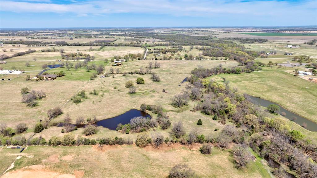 12592 Friendship Road Pilot Point, TX 76258 - Photo 12 of 22 a view of city and ocean
