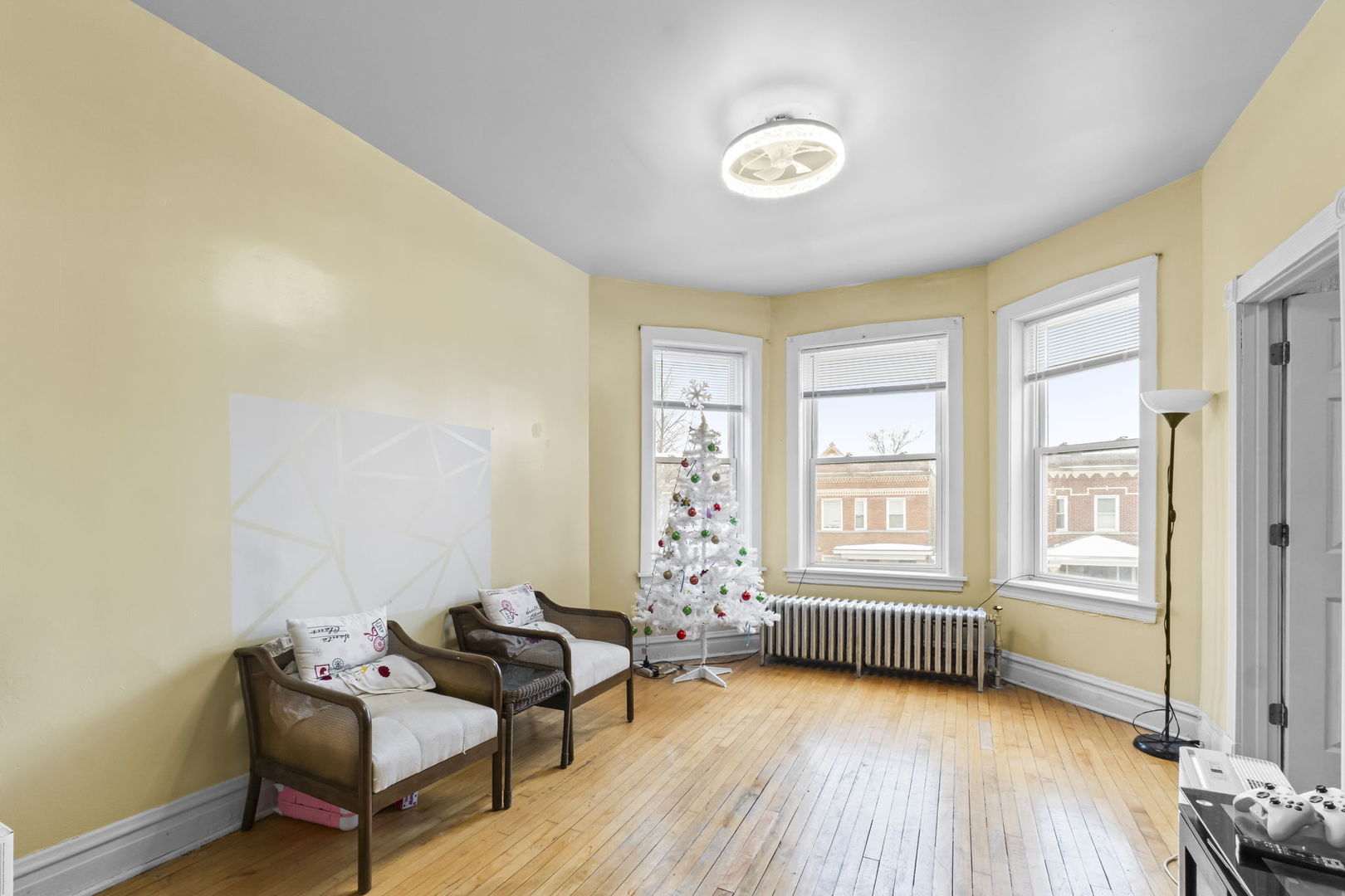 4920 West Iowa Street Chicago, IL 60651 - Photo 2 of 33 a living room with furniture and a window