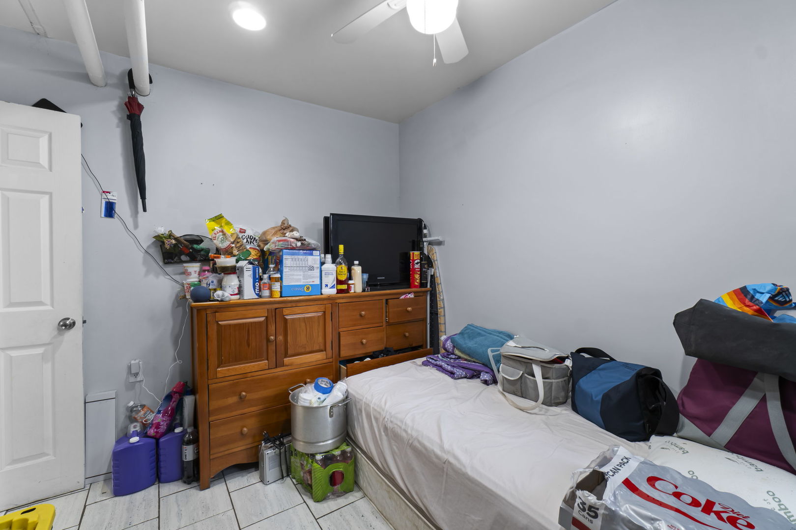 4920 West Iowa Street Chicago, IL 60651 - Photo 32 of 33 a bed room with a bed and a window