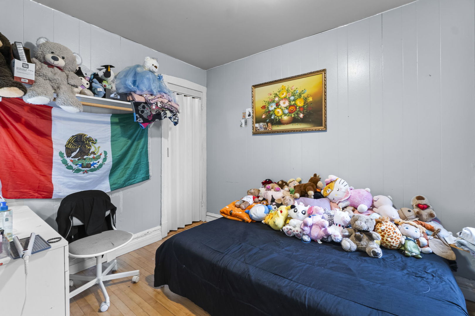 4920 West Iowa Street Chicago, IL 60651 - Photo 10 of 33 a bed room with a bed and a table