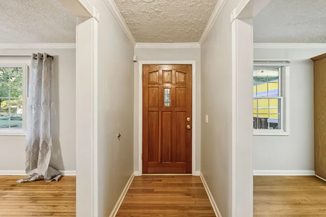 a view of a room that has a window in it