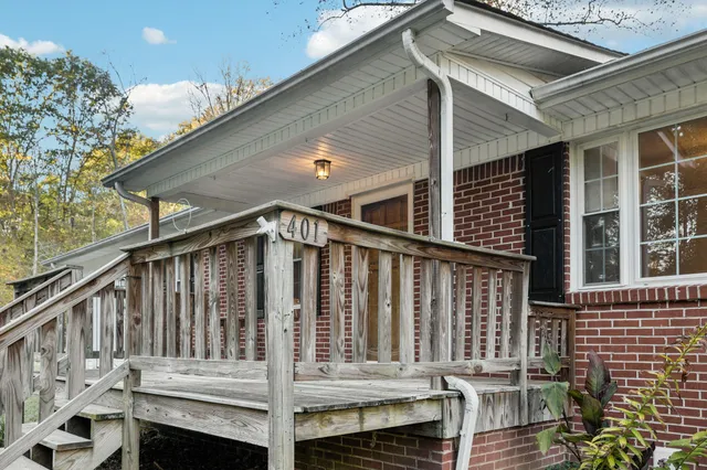 a view of wooden house with a window