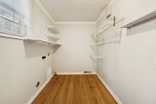 a view of a room with racks on the wall