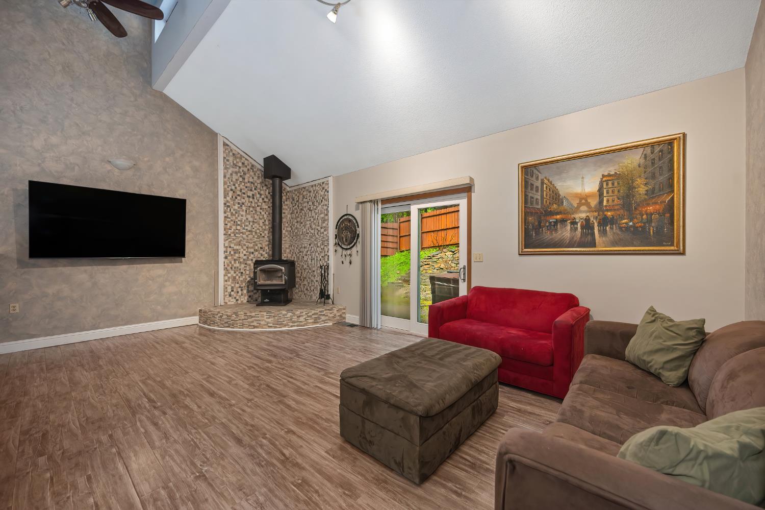 4580 Jenkinson Circle Pollock Pines, CA 95726 - Photo 12 of 78 a living room with furniture and a flat screen tv