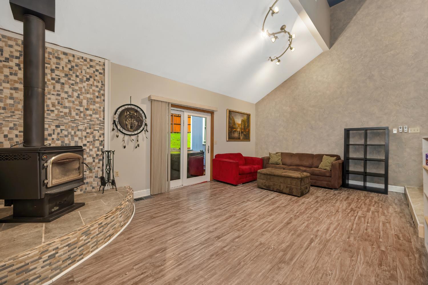 4580 Jenkinson Circle Pollock Pines, CA 95726 - Photo 13 of 78 a bedroom with furniture and wooden floor