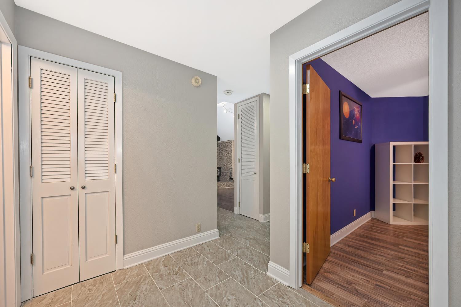 4580 Jenkinson Circle Pollock Pines, CA 95726 - Photo 16 of 78 a view of a hallway with wooden floor and entryway