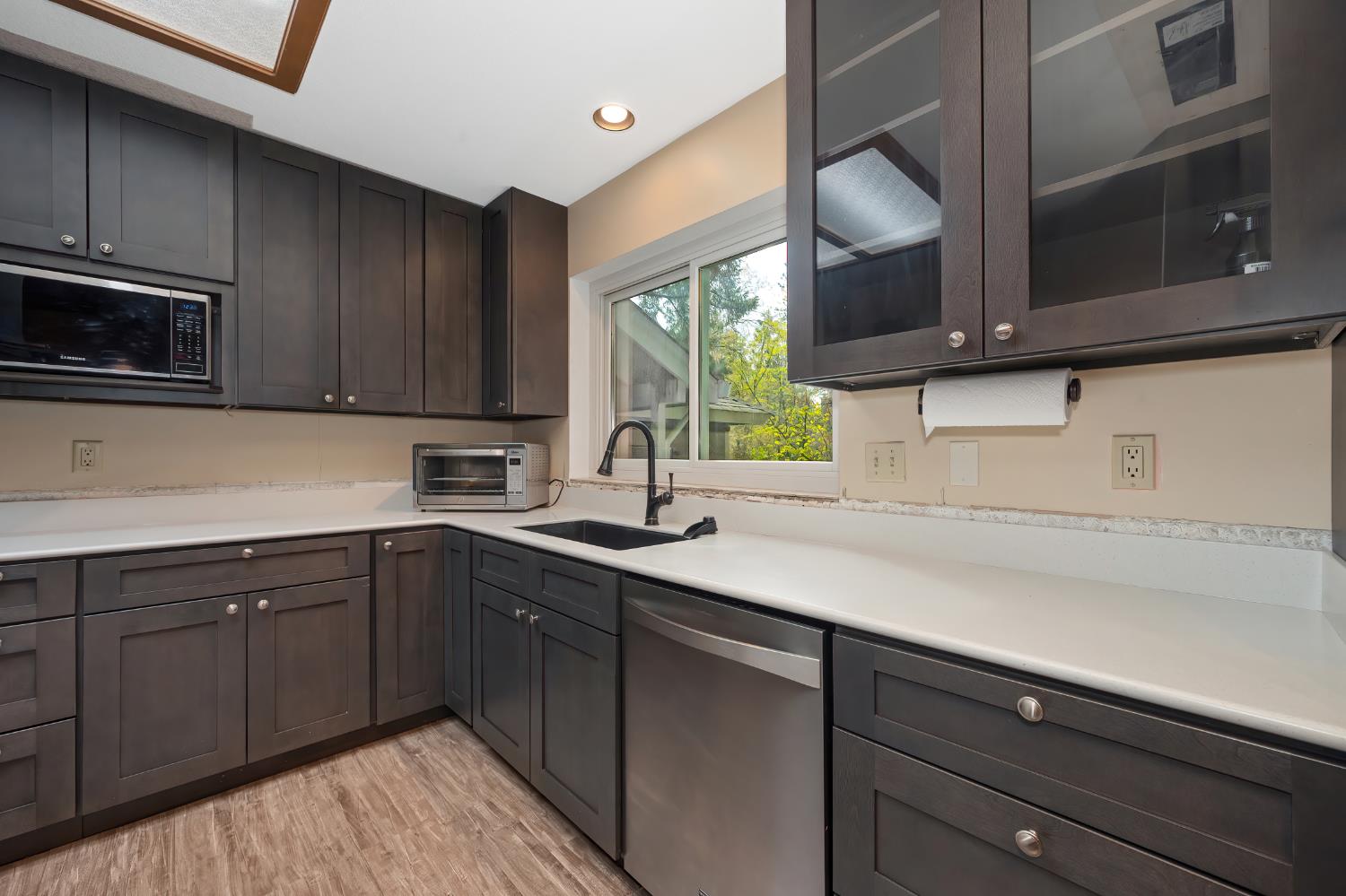 4580 Jenkinson Circle Pollock Pines, CA 95726 - Photo 29 of 78 a kitchen with stainless steel appliances granite countertop a sink and cabinets