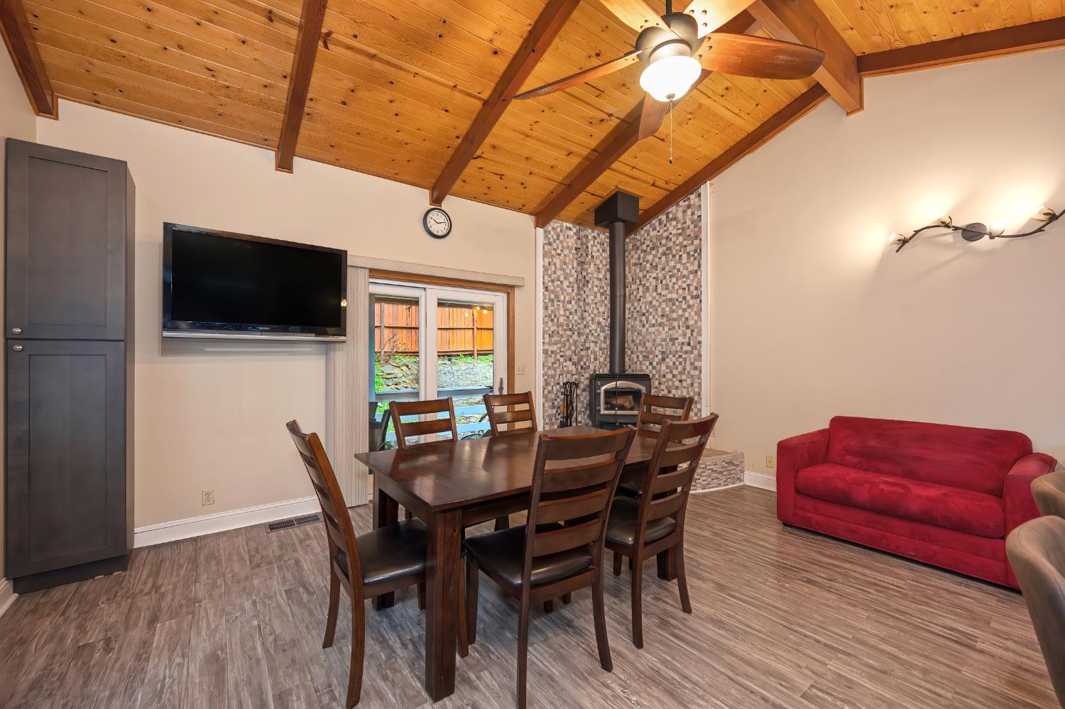 4580 Jenkinson Circle Pollock Pines, CA 95726 - Photo 32 of 78 a view of a dining room with furniture window and wooden floor