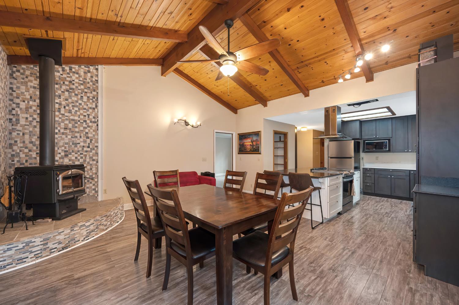 4580 Jenkinson Circle Pollock Pines, CA 95726 - Photo 33 of 78 a view of a dining room with furniture window and wooden floor