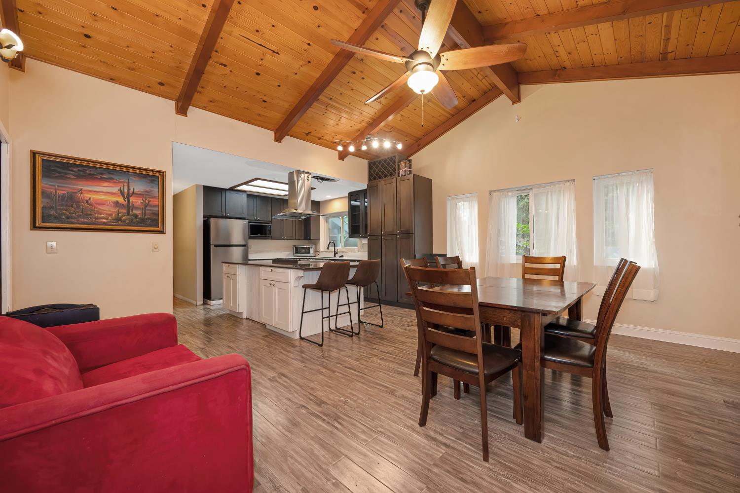 4580 Jenkinson Circle Pollock Pines, CA 95726 - Photo 34 of 78 a view of a dining room with furniture and wooden floor