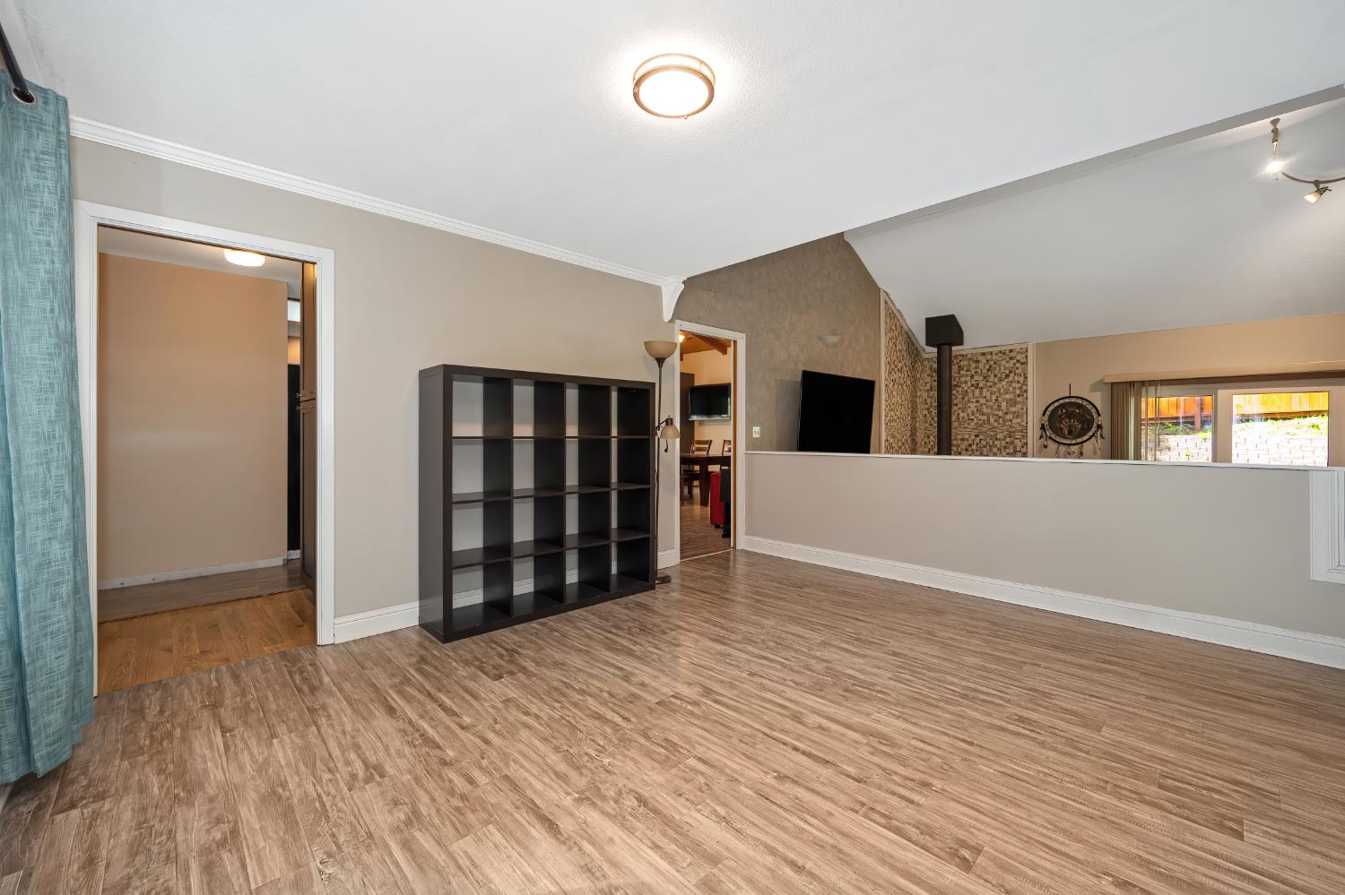 4580 Jenkinson Circle Pollock Pines, CA 95726 - Photo 40 of 78 a view of an empty room with closet and kitchen