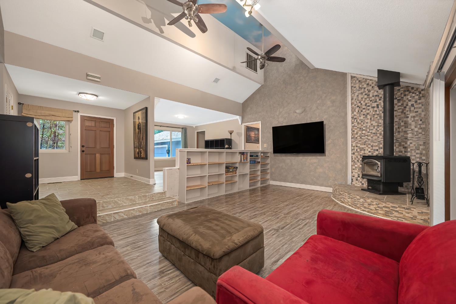 4580 Jenkinson Circle Pollock Pines, CA 95726 - Photo 7 of 78 a living room with furniture and a flat screen tv