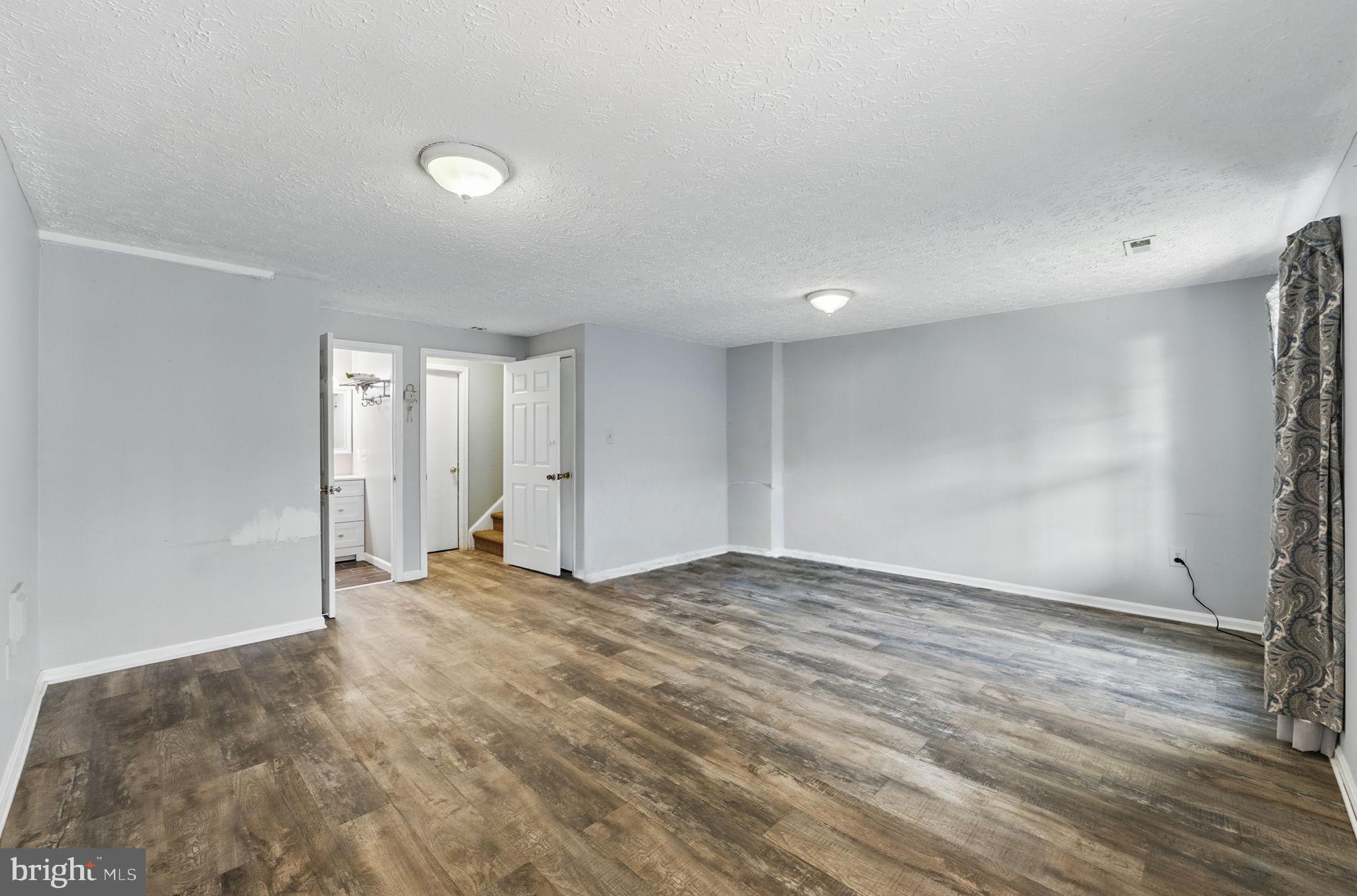 6837 Cottingham Lane Centreville, VA 20121 - Photo 20 of 25 a view of an empty room
