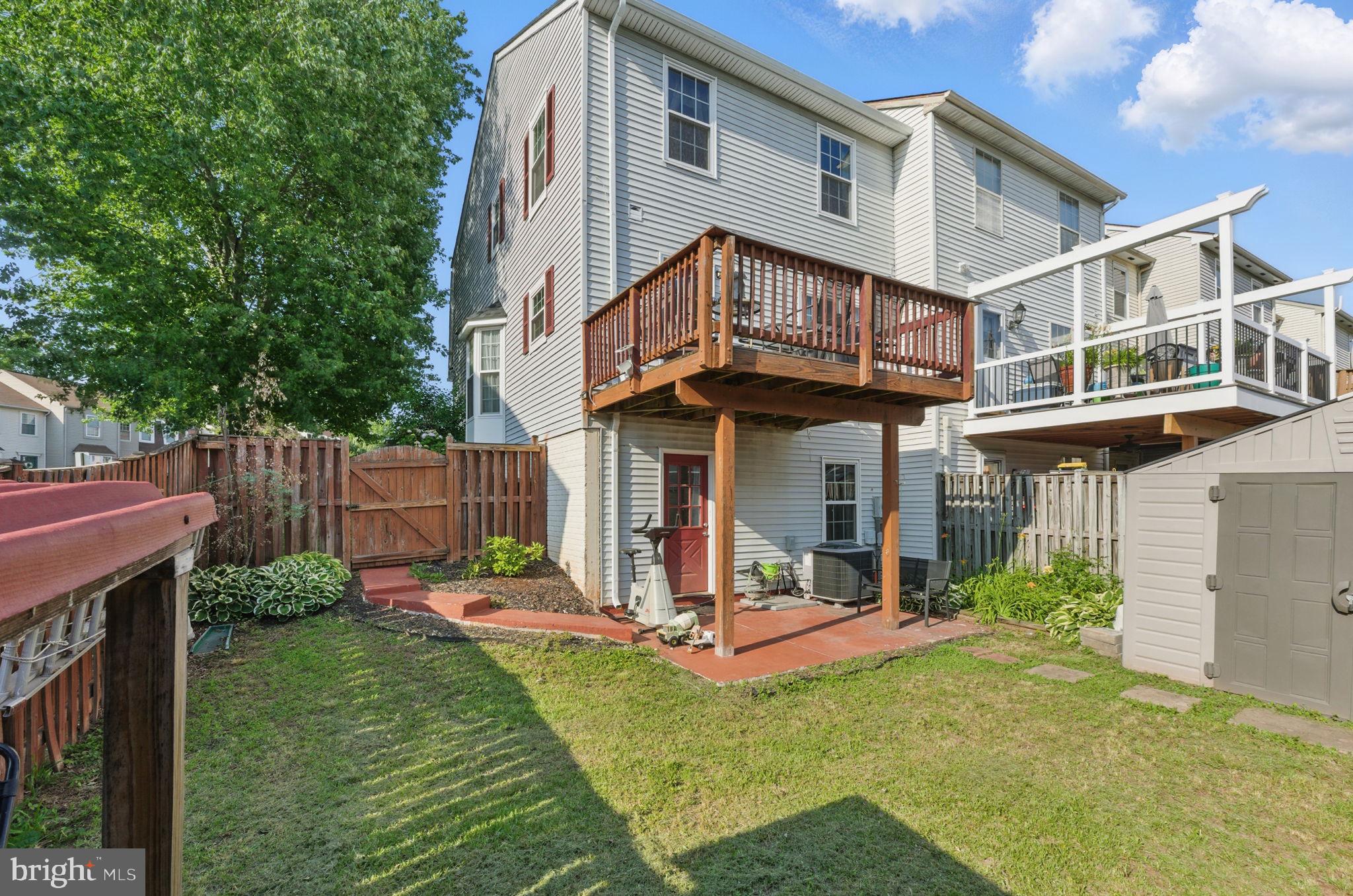 6837 Cottingham Lane Centreville, VA 20121 - Photo 25 of 25 a view of a house with a yard and plants
