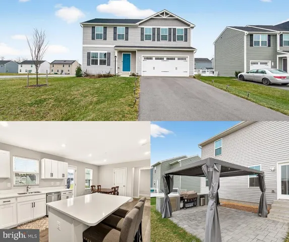 a view of living room kitchen and kitchen