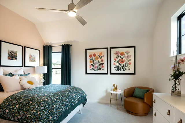 a bedroom with a bed and furniture