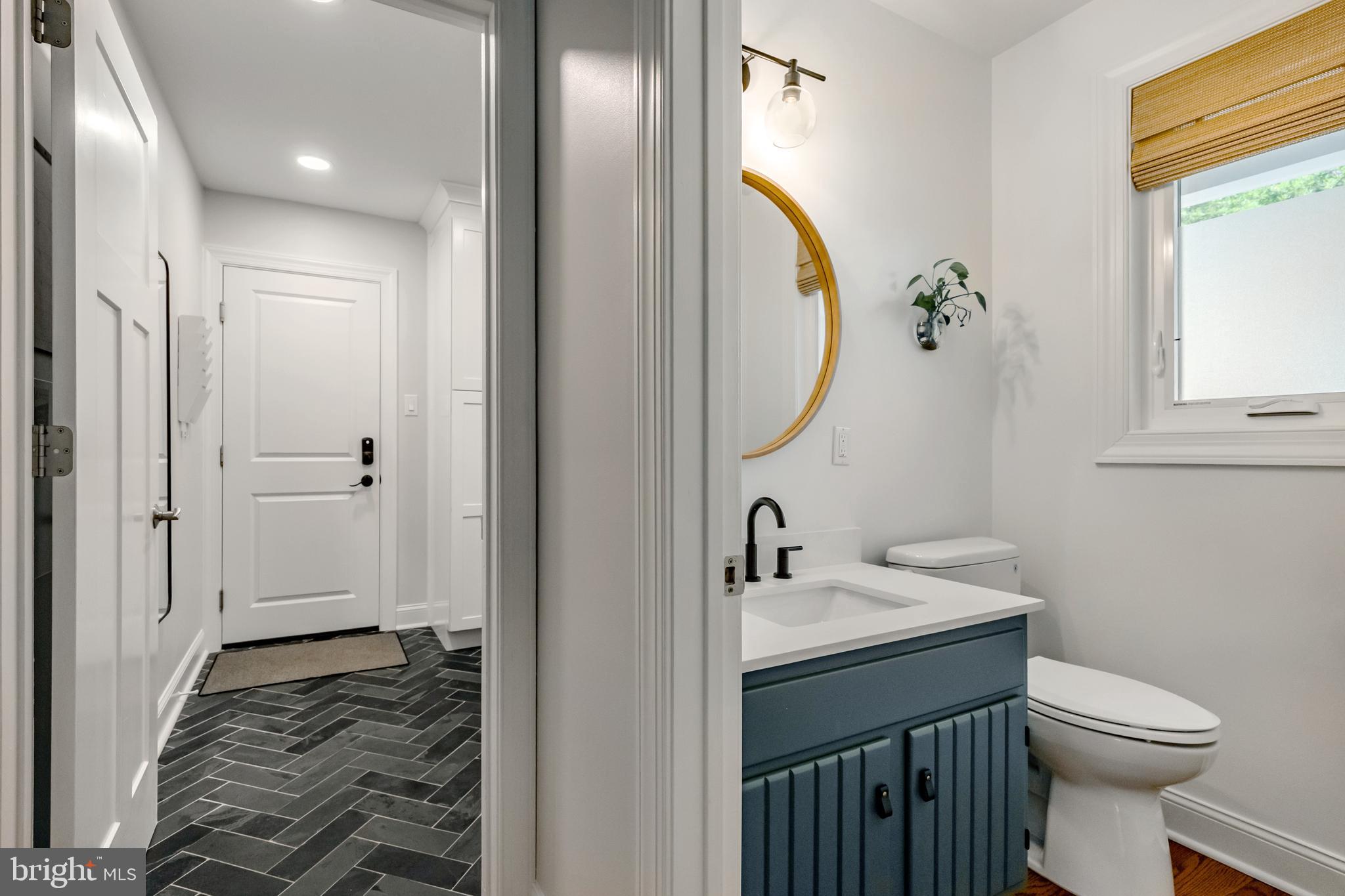 65 Roberts Road Newtown Square, PA 19073 - Photo 26 of 53 a bathroom with a sink and a mirror