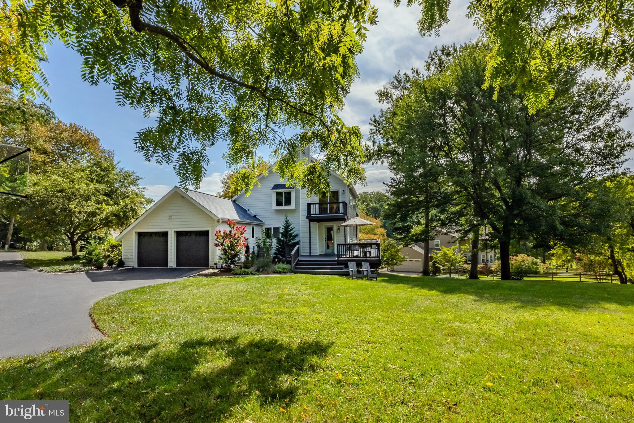65 Roberts Road Newtown Square, PA 19073 - Photo 3 of 53 a view of a house with a yard and sitting area