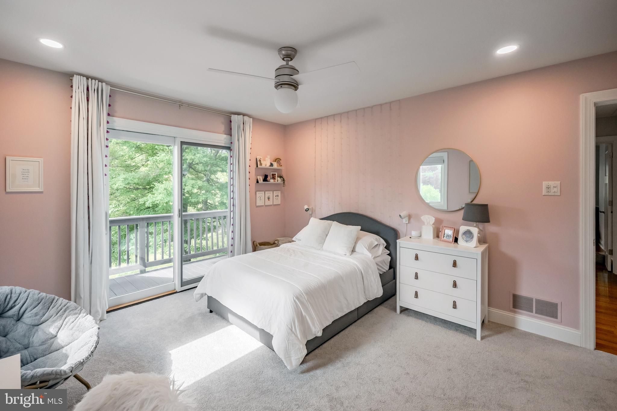 65 Roberts Road Newtown Square, PA 19073 - Photo 35 of 53 a spacious bedroom with a bed and a large window