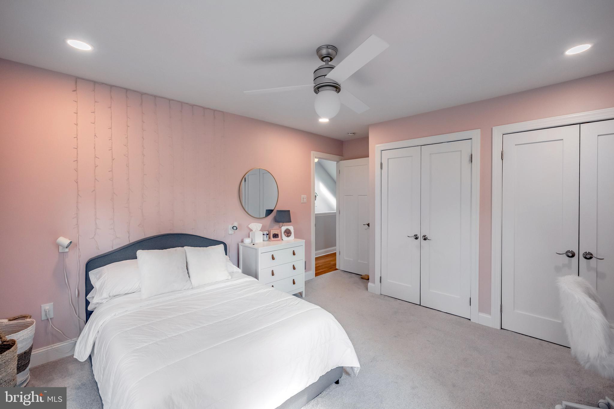 65 Roberts Road Newtown Square, PA 19073 - Photo 36 of 53 a bedroom with a bed and a chandelier