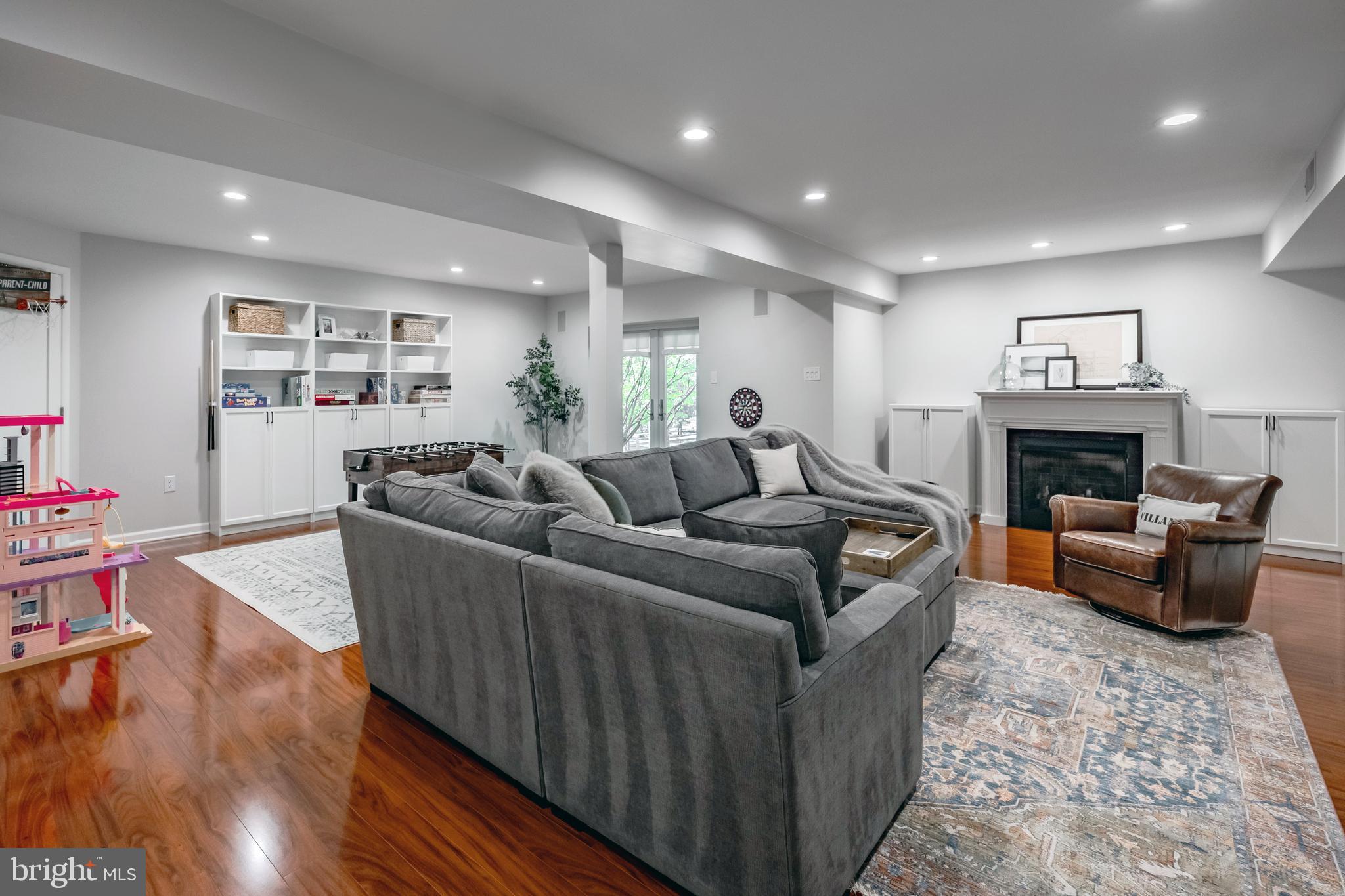 65 Roberts Road Newtown Square, PA 19073 - Photo 41 of 53 a living room with furniture and a fireplace