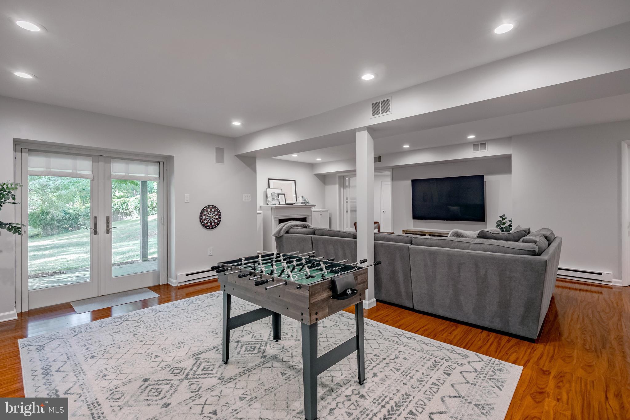 65 Roberts Road Newtown Square, PA 19073 - Photo 42 of 53 a living room with furniture and a flat screen tv