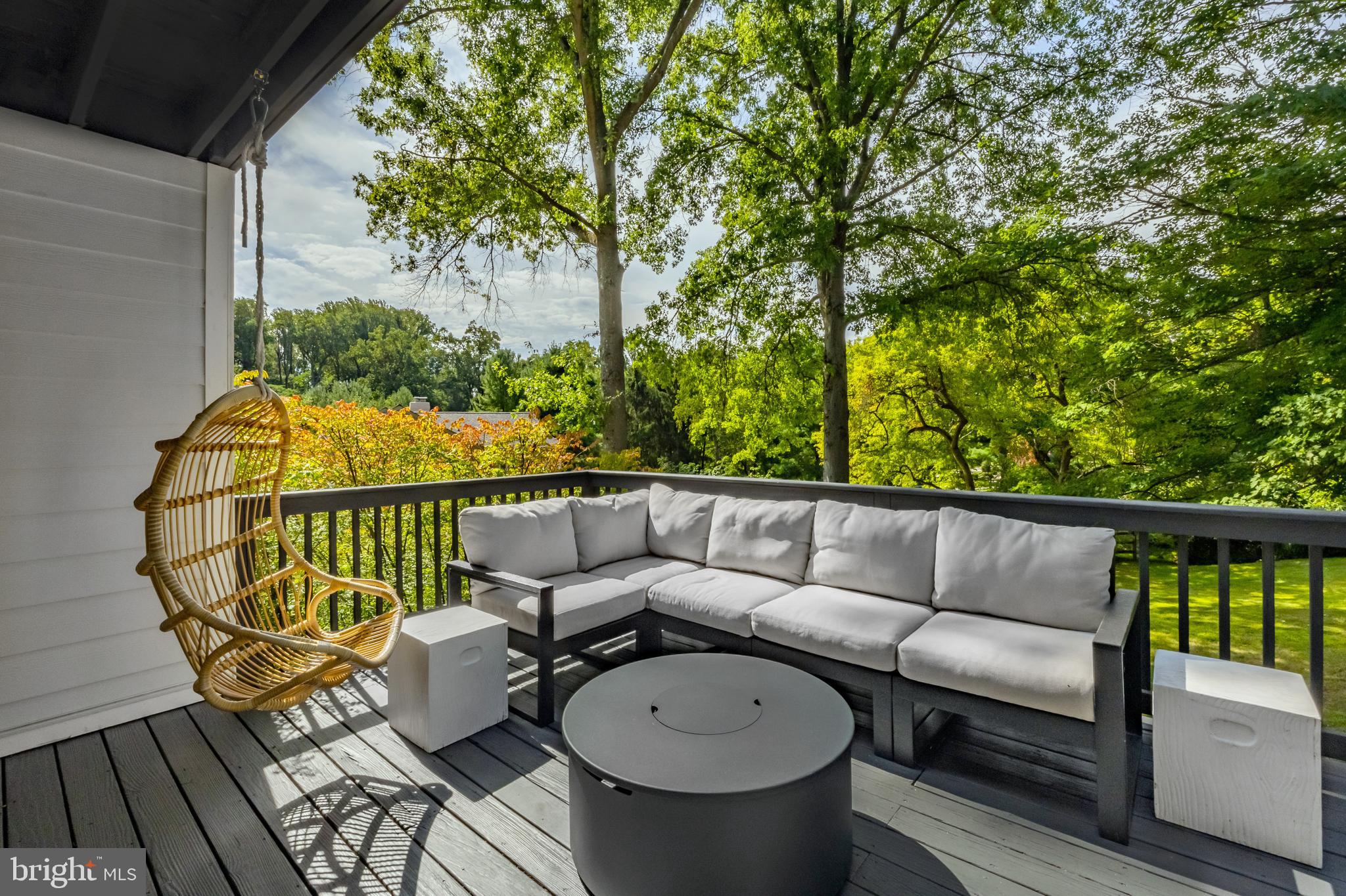 65 Roberts Road Newtown Square, PA 19073 - Photo 49 of 53 a balcony with wooden floor and outdoor seating