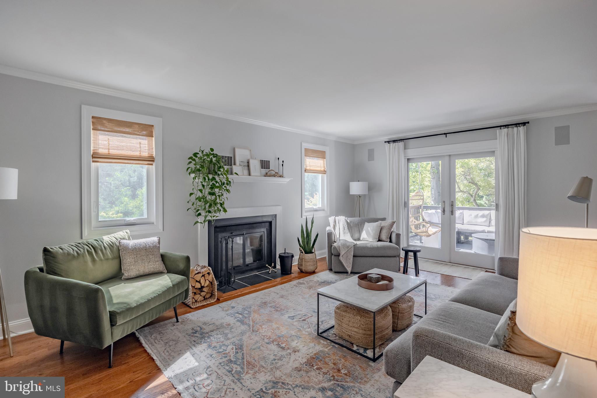 65 Roberts Road Newtown Square, PA 19073 - Photo 9 of 53 a living room with furniture and a fireplace