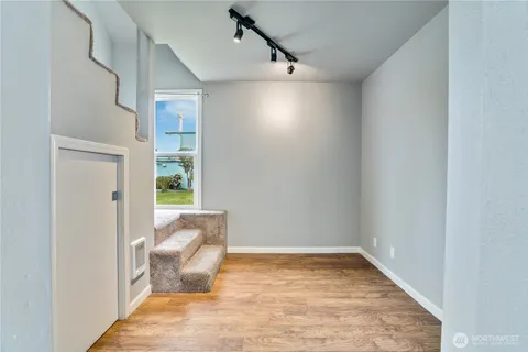 a view of an empty room and window