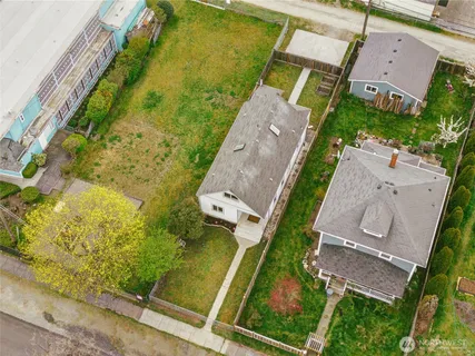 an aerial view of a house with a garden