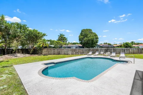 a view of a swimming pool and outdoor space