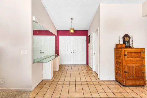 a very nice looking room with wooden floor