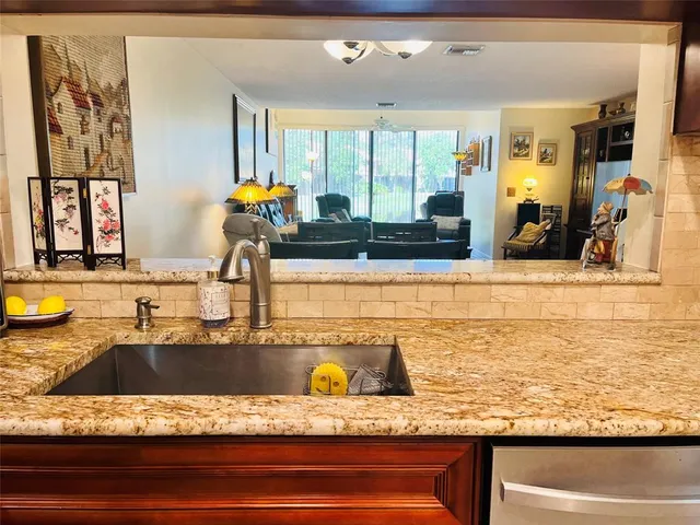 a bathroom with mirror sink