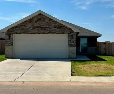 a view of backyard of house