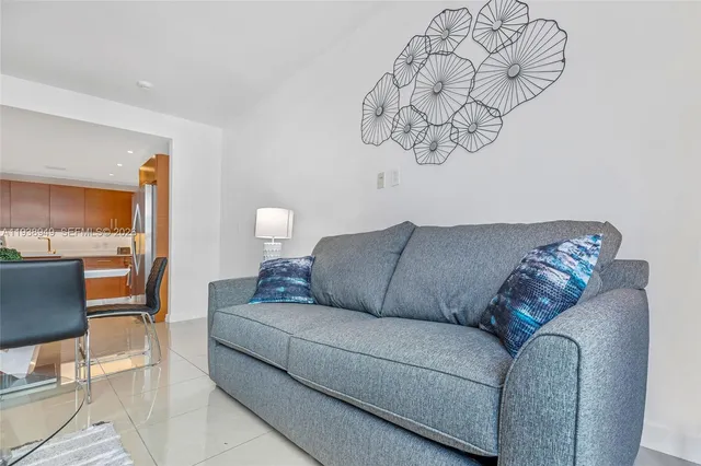 a living room with furniture and a couch