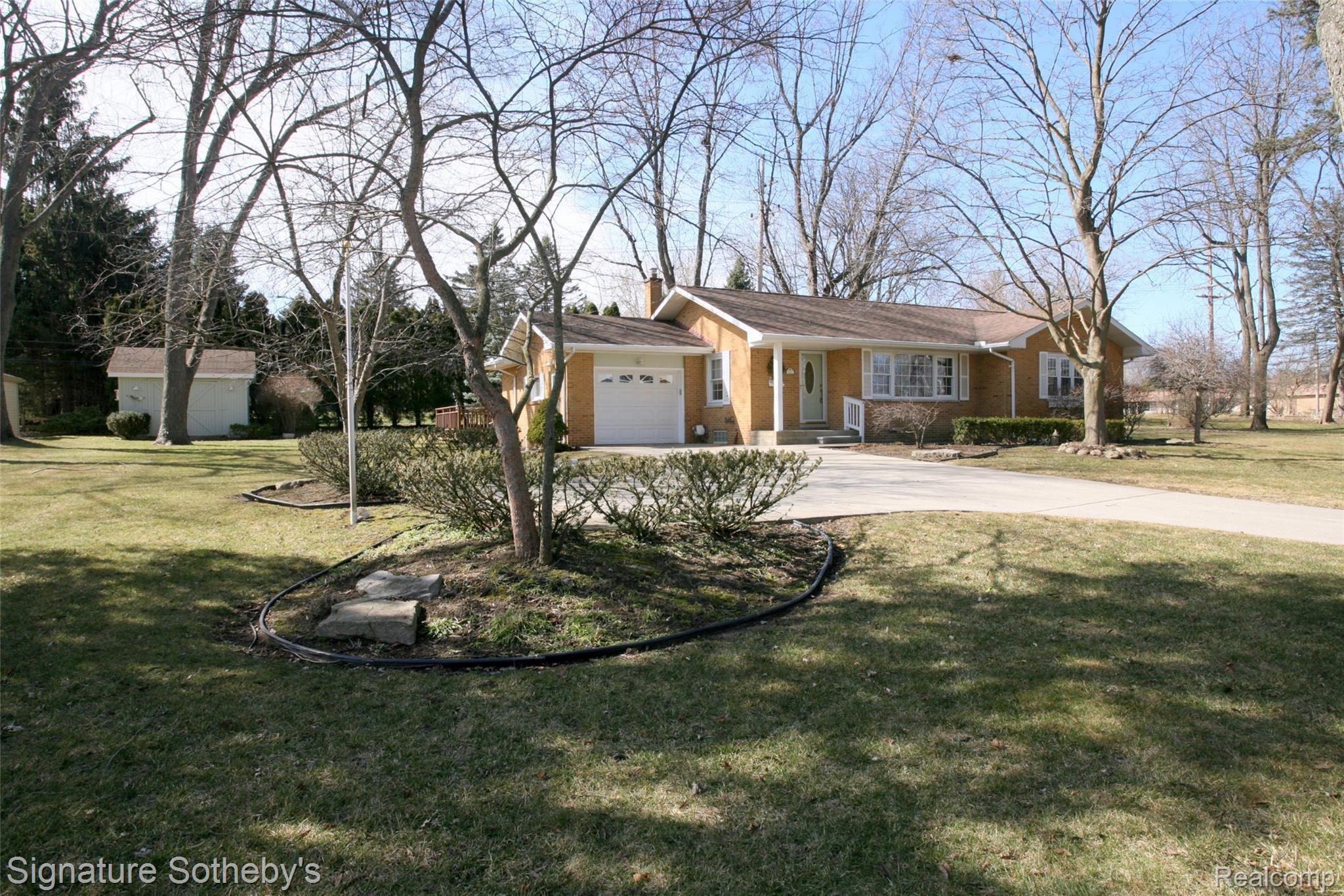 The Brick Ranch in the Village You Have Been Waiting For