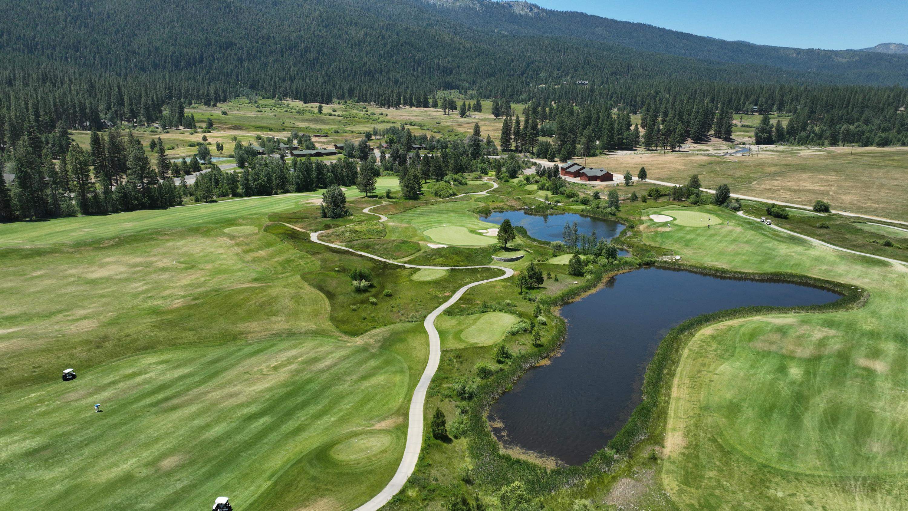134 Quail View Circle Clio, CA 96106 - Photo 41 of 49 a view of a lake with a houses